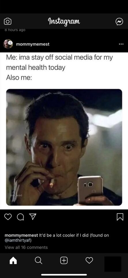 a close up of a person holding a cell phone in their hand